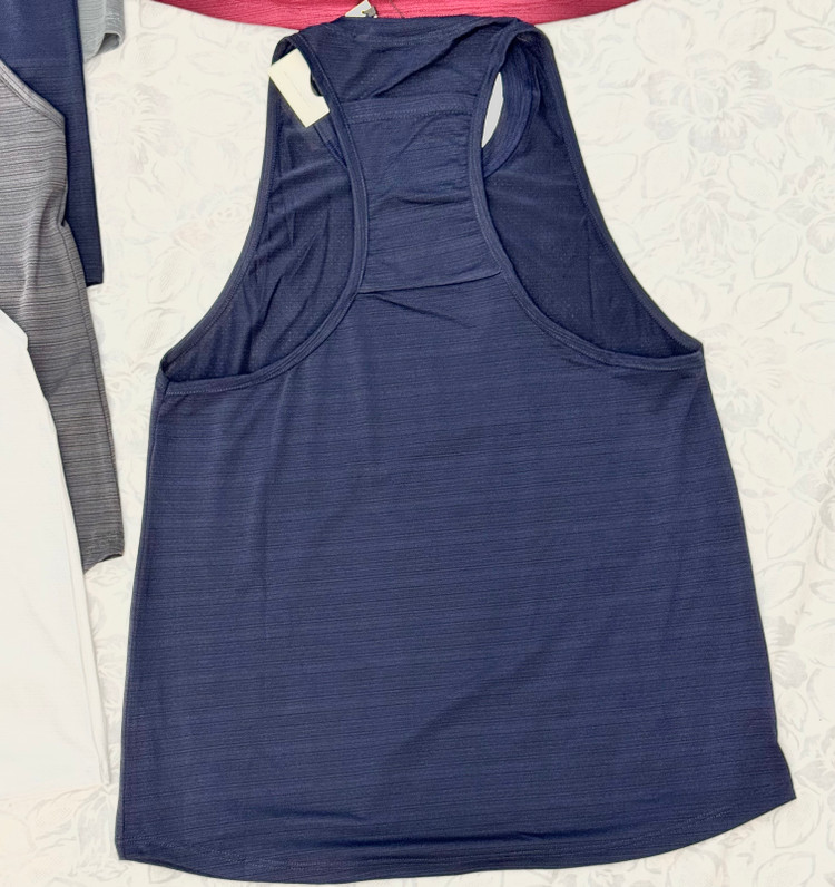 تاپ رکابی پشت جیب دار نایک